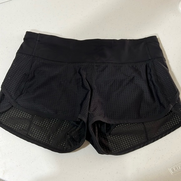 Lululemon athletica  running shorts black mesh size 4 ca35801 RN 106259 - Picture 1 of 9